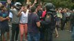 Catalonia referendum: Voters confront police in Barcelona