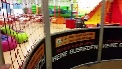Indoor playground for kids little kid playing footbal