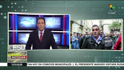 Catalanes hacen filas durante horas para participar en el referendo