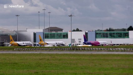 Monarch Airlines aircrafts at London Luton and Manchester Airport