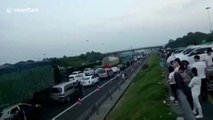 Start of holidays in China brings traffic misery to thousands