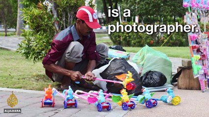Cet homme né sans mains et sans jambes est parvenu à devenir un photographe talentueux malgré sa particularité