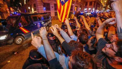 Protesters urge national police to leave Catalonia after crackdown