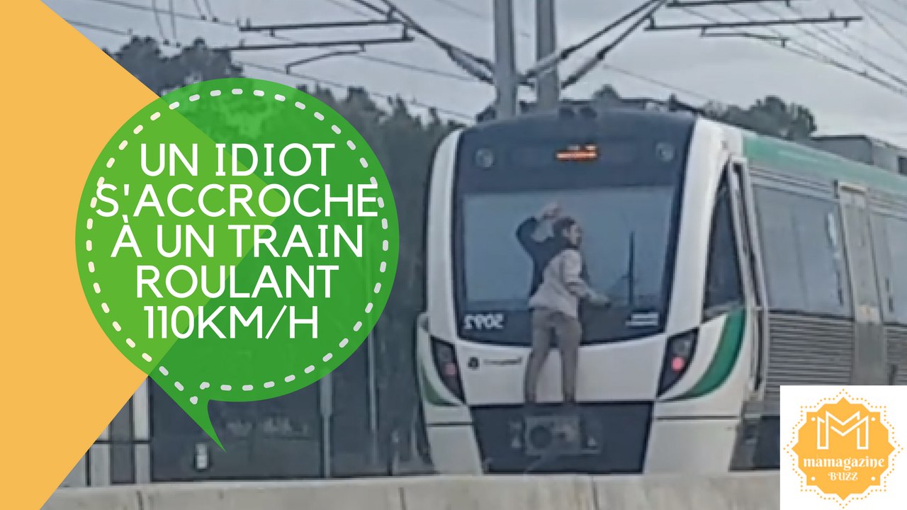 Un idiot s'accroche à un train roulant 110km/h !!