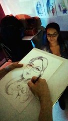 Dibujando caricatura en el evento Caos en Bogotà