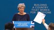 Theresa May handed P45 by comedian at Conservative Party Conference