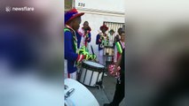 NYPD officer in drum battle with Jamaican marching band
