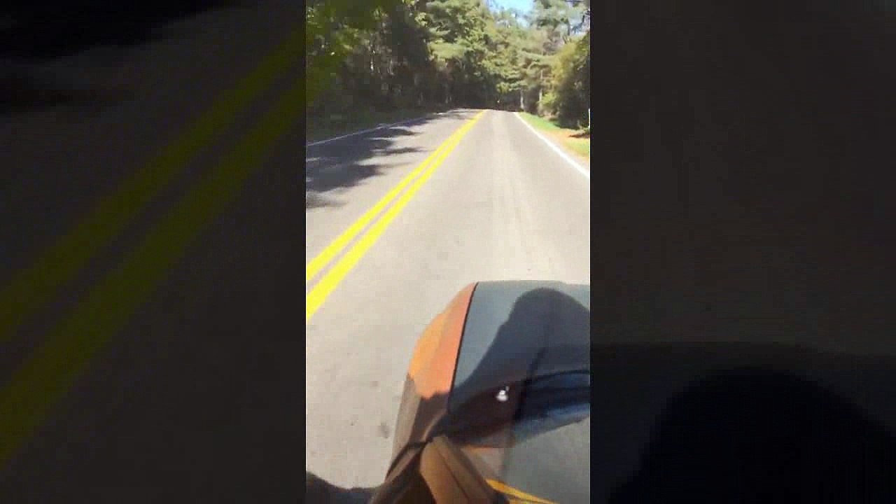 faire du skate en voiture en descente