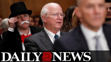 Monopoly man pops up behind former Equifax CEO at Senate hearing