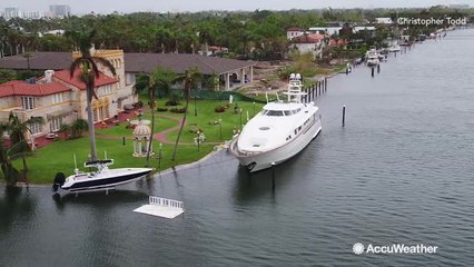 Drone of king tide floods breaking into Miami Beach