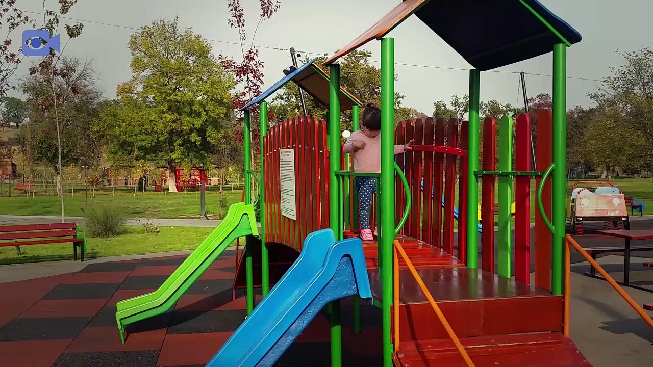 Funny Kids and Giant Toys on the playground Amusement park for children