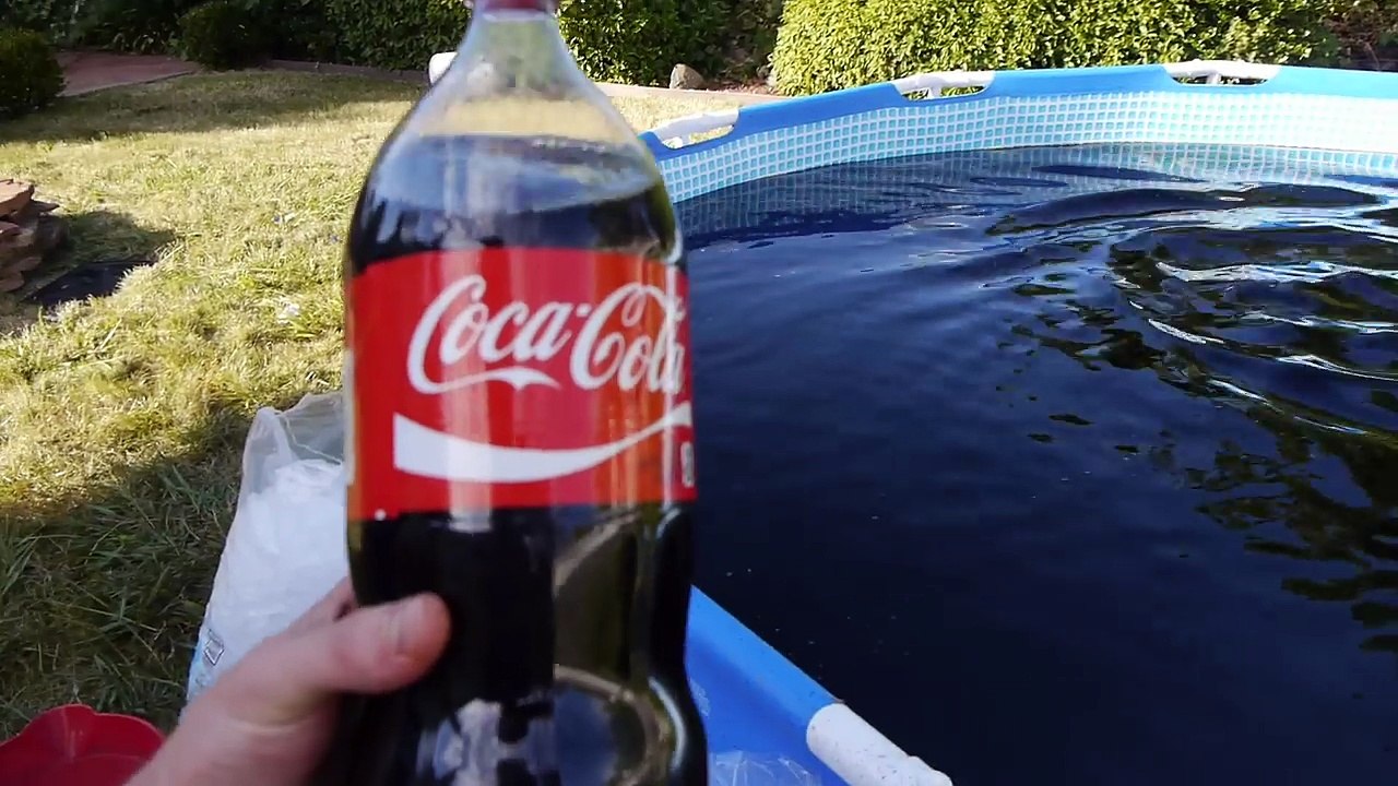 Taking a Bath in a Giant 1,500 Gallon Coca-Cola Swimming Pool!
