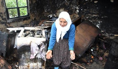 Yangında eşyalarını kaybeden kadının feryadı yürekleri burktu