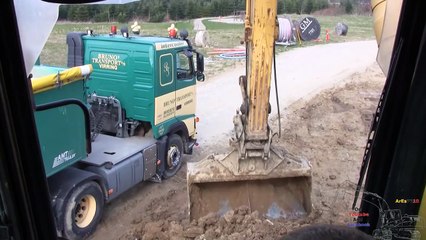 Loading Volvo Truck With The Komatsu Excavator: Cab View