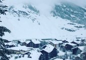 Snow Cascades Down Mountain Towards Zermatt