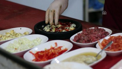 Video herunterladen: Gastronomi şehrinin vazgeçilmez lezzeti 'Belen Tava' - HATAY