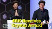 SRK Receives Crystal Award, recreates signature pose in Davos