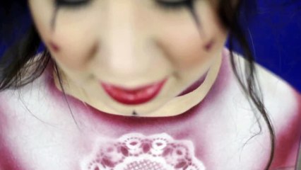 New style face painting on fire dancer - Hestia Fire Dance