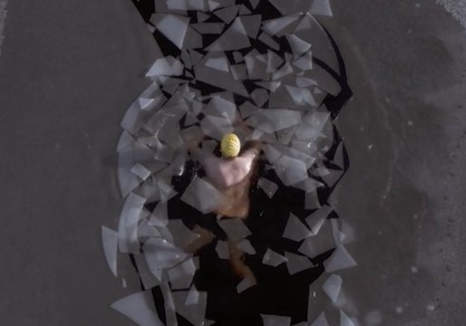 Swimmer Takes the Plunge Into Frozen Lake in Scottish Highlands