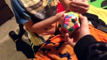 Psycho kid rages at Rubiks cube