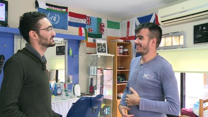 قبارصة من المجموعتين اليونانية والتركية في بيلا يريدون تعايشهم نموذجا لاعادة توحيد الجزيرة