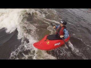 Father and Son Enjoy Canoeing Adventure