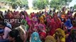 India: Rajasthan farmers go neck-deep for land deal protest