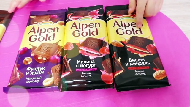 Альпен Гольд темный шоколад миндаль Изюм