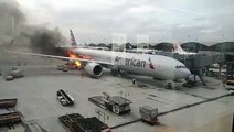 En plein embarquement d'un avion, le chargement prend feu!