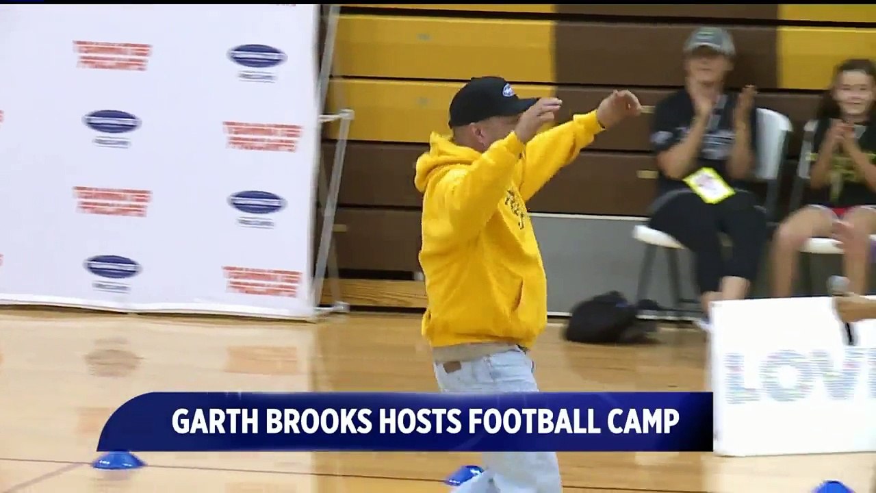 Garth Brooks Hosts Professional Football Camp for Children