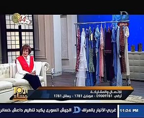 سميرة أحمد تجرى حواراً تليفزيونياً مرتدية العلم المصرى