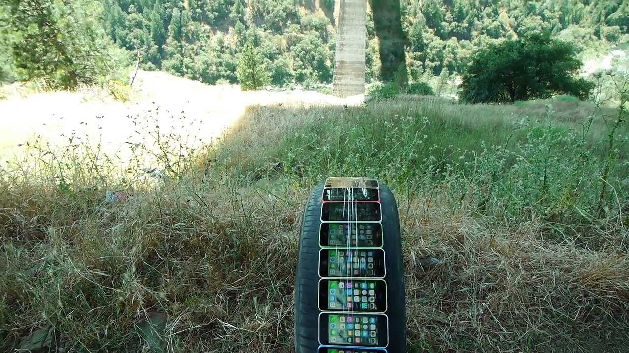 How Many iPhones Will Survive in Tire Rolling Down Cliff