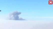 California wildfire: Mid-flight video captures smoke and haze rising through clouds