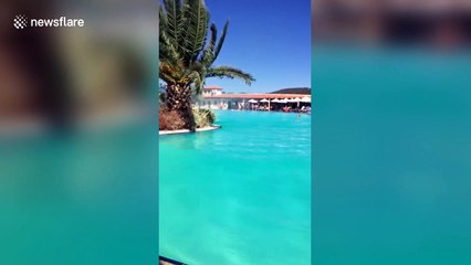 Shocking footage shows mini-tornado in hotel pool in Greece