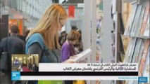 المستشارة الألمانية والرئيس الفرنسي يفتتحان معرض للكتاب في فرانكفورت