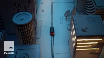 This toy car is traveling around a paper city powered by a battery and electric ink