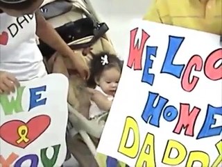 Children Welcome Home Their Daddy from Iraq at the Airport