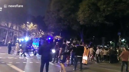 The Spanish police van appears to force its way through crowd