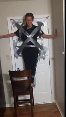 GIRL IS TAPED TO DOOR AND IS ALMOST CHOKED