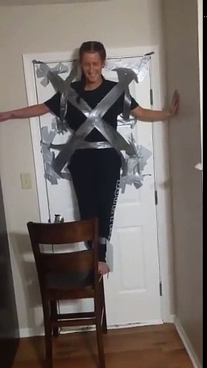 GIRL IS TAPED TO DOOR AND IS ALMOST CHOKED