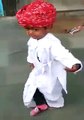 A cute Rajasthani (Indian) boy dancing