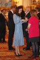 Kate Middleton shows off baby bump amid third pregnancy
