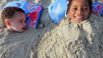 Babies Buried in the Sand!