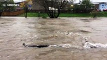 Cumbria river bursts its banks