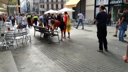 Protesters clash in downtown Barcelona on Spain National Day