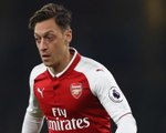 Wenger insists Ozil contract talks progressing positively