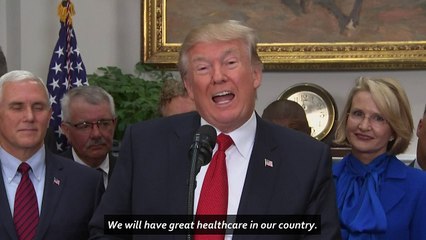 Awkward moment Trump forgets to sign executive order