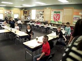 Sergeant First Class Marshall Returns Home From Iraq, Surprises Daughter at School