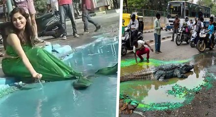 பெங்களூர் சாலை பள்ளத்தில் தோன்றிய கடல் கன்னி!-வீடியோ