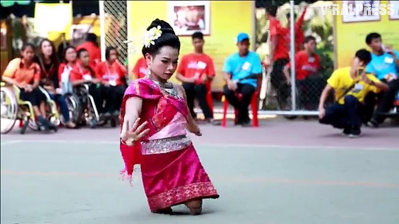 Disabled boy's beautiful dance while dressed as a woman